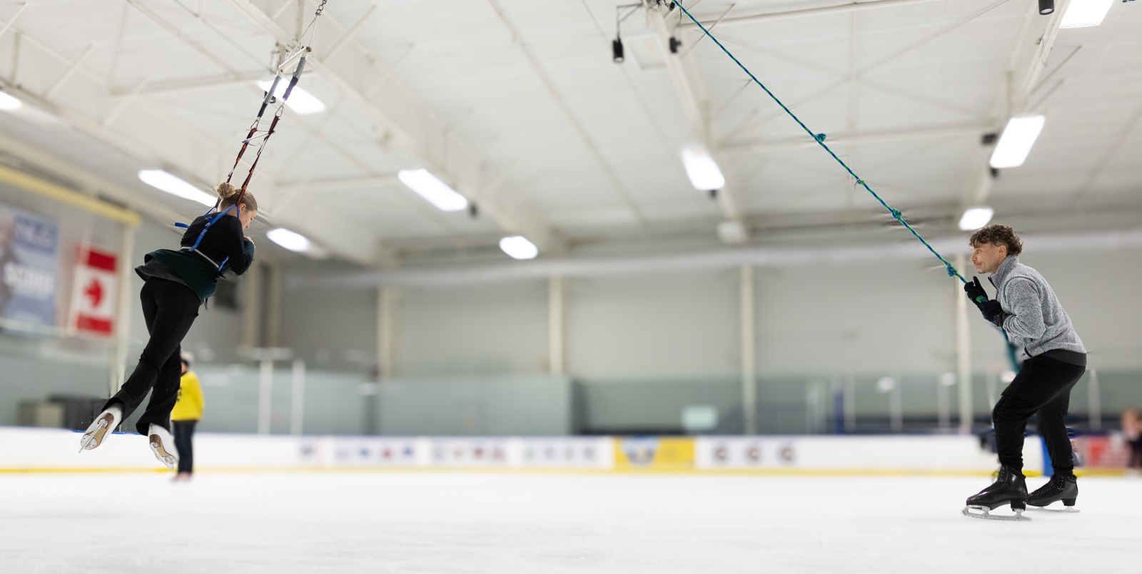 Figure skater on the ice in dramatic light — figure skating coaching in Dallas-Fort Worth